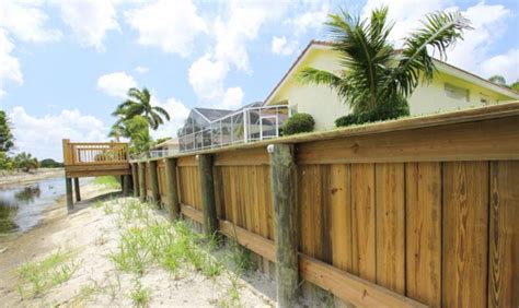 Wood seawalls are designed and engineered with tie-backs to regain the ...