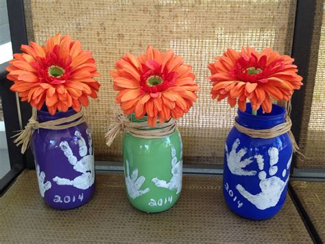 Mother's Day vases. Mason jars with acrylic paint. Handprints of kids/grandchild… | Diy mother's ...