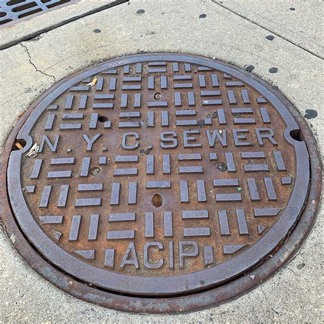 New York City Standard Manhole Frame and Cover - American Cast Iron Products, Inc.