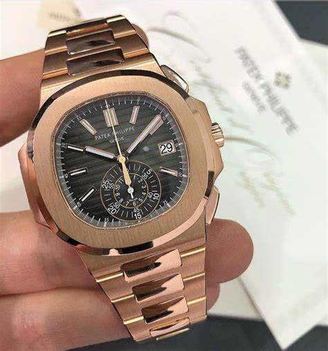 PATEK PHILIPPE NAUTILUS ROSE GOLD 5980/1R-001 - Carr Watches