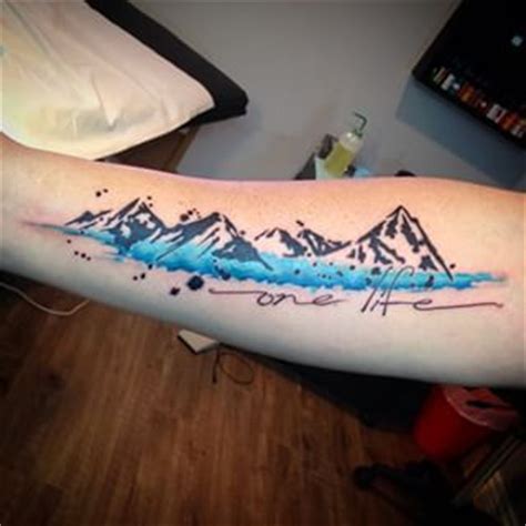 Watercolor mountains tattoo, Mountain tattoo, Wanderlust tattoo