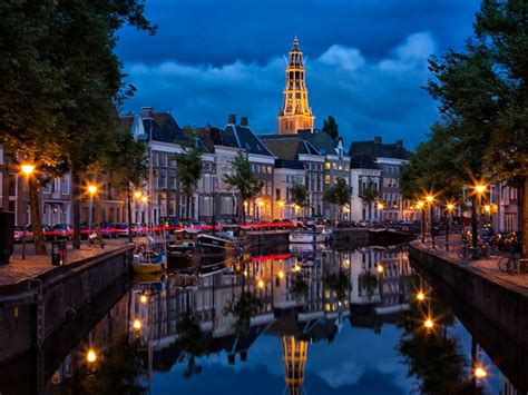 Canal in Groningen, in the north of the Netherlands, in the evening ...