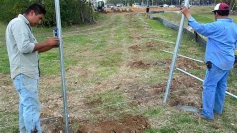 Setting Galvanized Fence Posts - YouTube