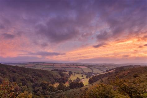 Colourful sunrise image of The Punchbowl from Winsford Hill