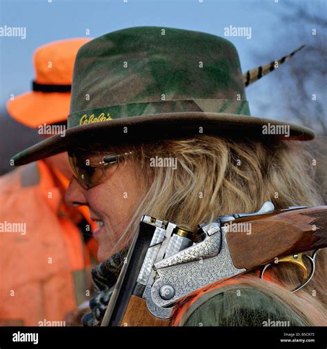 Woman Sportswoman with Shotgun during Pheasant Hunt on Kansas Farm Stock Photo - Alamy