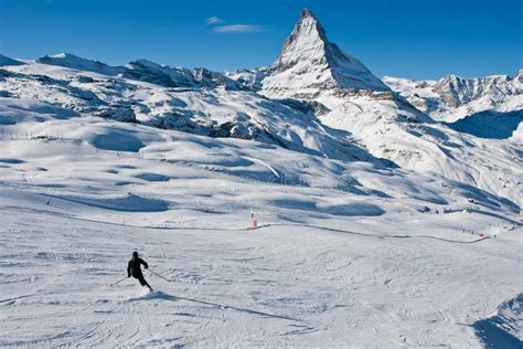 Skiing in the Swiss Alps Alone Stock Photo - Image of sport, blue: 22761690