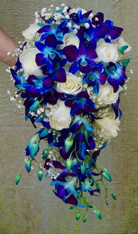 Blue orchid bouquet | Blue orchid wedding, Cascading wedding bouquets ...