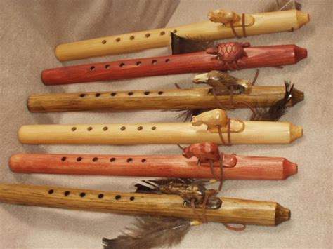 Native American Hand Crafted Flutes - Don't you just love the hand carved blocks on these fl ...