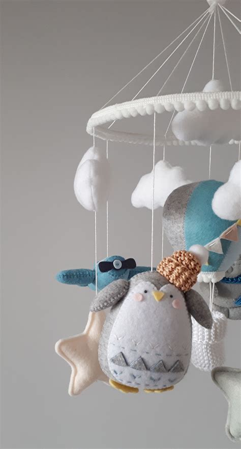 Baby crib mobile as boy nursery decor, clouds and stars cot mobile with penguin and bear ...