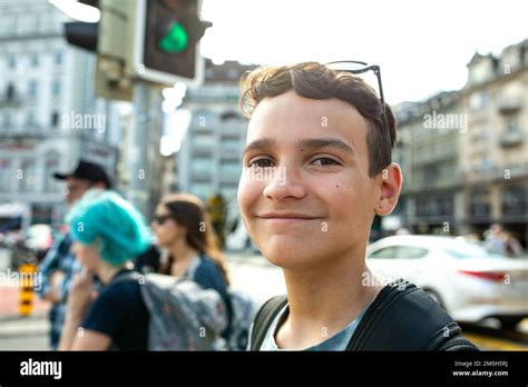 Teen Boy Smiles At A Crosswalk In Lucerne Switzerland Stock Photo - Alamy