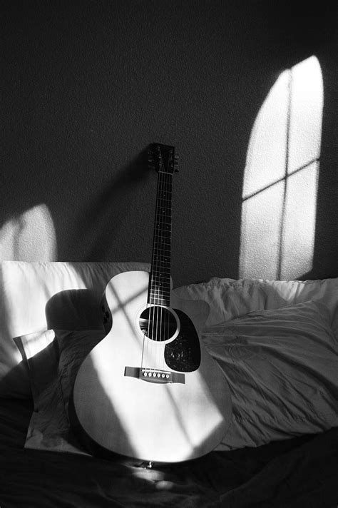 White Acoustic Guitar on Grey and White Textile · Stock, Black Acoustic ...