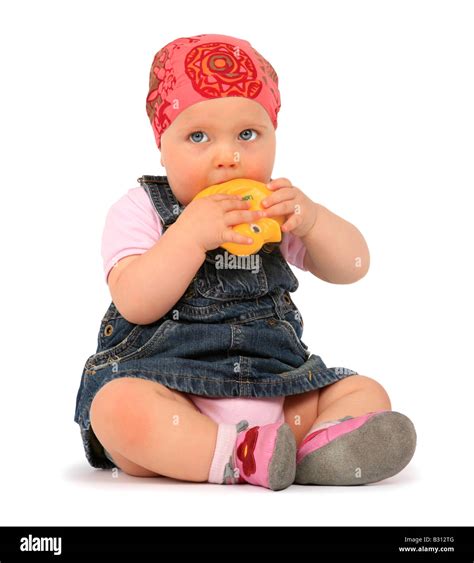 Child biting rubber duck hi-res stock photography and images - Alamy