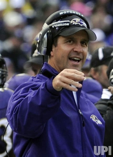 Photo: Ravens head coach Harbaugh walks sideline in Baltimore ...