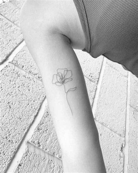 One line flower tattoo on the inner arm. | Simple arm tattoos, Tattoos ...