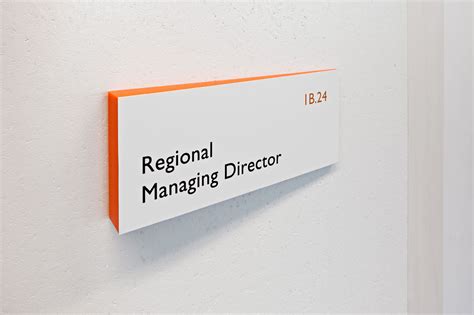 studio dumbar designs sustainable signage for TNT Green Office headquarters door signage ...