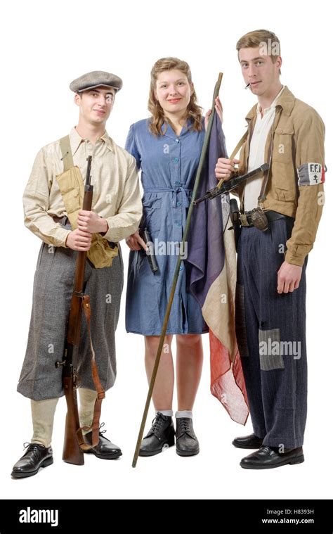 three young French Resistance, vintage clothes and weapons, reenactment ...