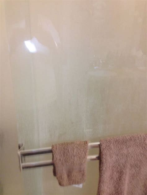 How do you clean hard water spots on shower doors? | Hometalk