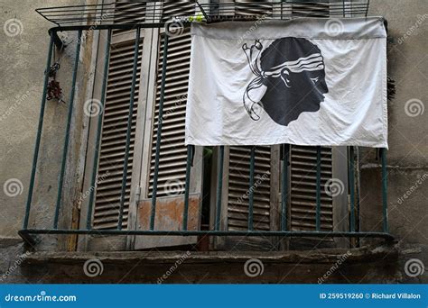 Corsican Flag with Its Moor`s Head Hanging on the Balcony of a Dwelling Editorial Image - Image ...