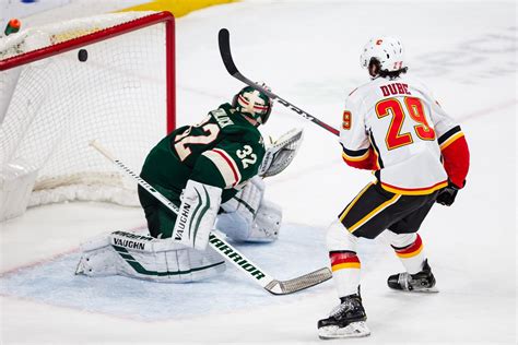 Dillon Dube scores in seventh round of shootout, Flames beat Wild 5-4 ...