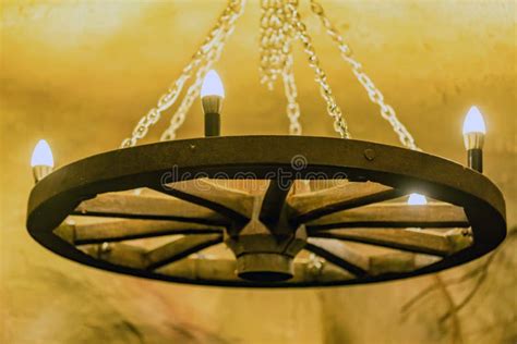 Rustic Wagon Wheel Chandelier Stock Image - Image of city, islam: 107527917