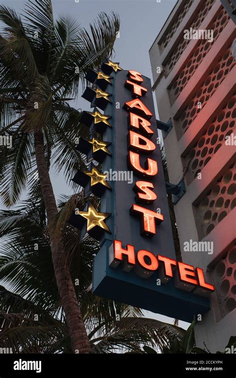 M, UNITED STATES - Aug 08, 2018: A vertical shot of a neon sign at ...