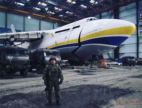 Russian VDV soldier in front of the AN-225 “Mriya”, before it’s destruction during the battle of ...