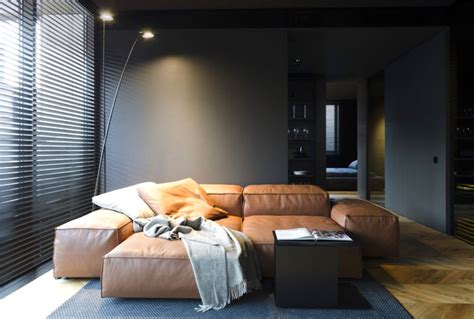 Small Masculine Apartment in Dark Color Schemes - InteriorZine