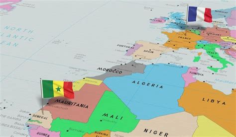 Premium Photo | France and senegal pin flags on political map 3d ...