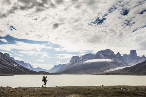 Auyuittuq national park hiking scene — luggage, Carrying - Stock Photo | #415994608