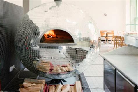 This Spherical Oven Functions As Both A Pizza Oven and A Disco Ball