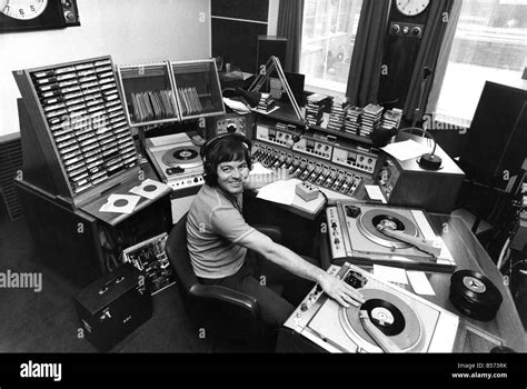 Radio I disc-jockey Tony Blackburn at the studio console equipped Stock ...