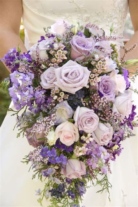 I saw this bouquet, but it had these dark purple daisy things I didn't ...