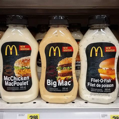 three bottles of mcdonald's chicken macaroni and cheese are on the shelf