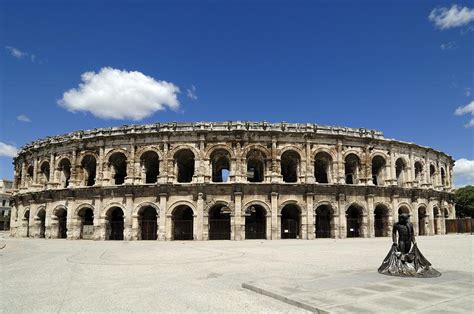 Roman Amphitheatre, Nimes, France Photograph by Chris Hellier