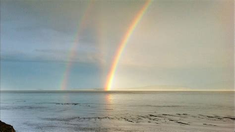 A triple rainbow?!? Photographer gets three bows in one shot | KOMO