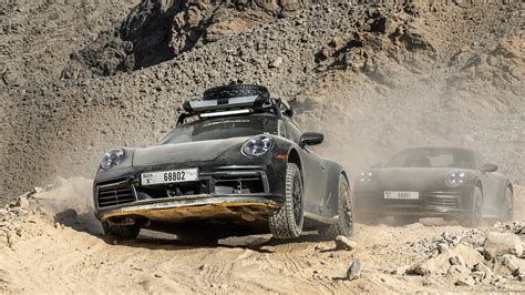 Porsche 911 Dakar – the sand-bashing rally-raid 911 is here | Flipboard