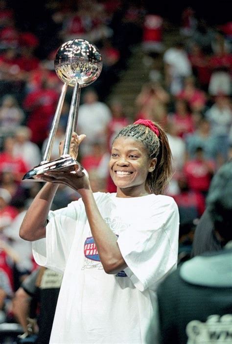 HOUSTON - AUGUST 26: Sheryl Swoopes #22 of the Houston Comets holds up ...