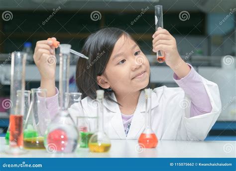 Happy Little Scientist Making Experiment Stock Photo - Image of happy, background: 115075662