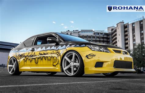 Yellow Scion TC with Custom Graphics and Lambo Doors — CARiD.com Gallery