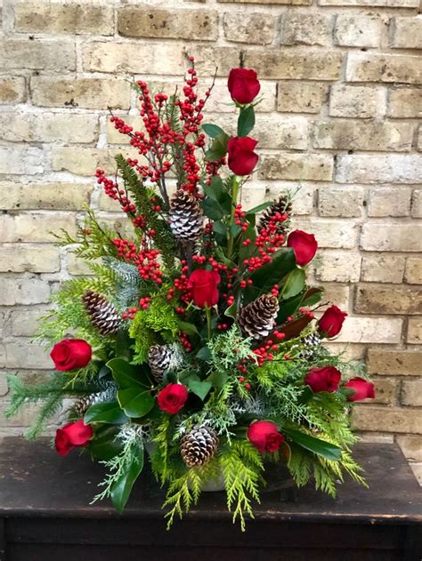 Holiday textures in 2023 | Christmas floral arrangements, Christmas ...