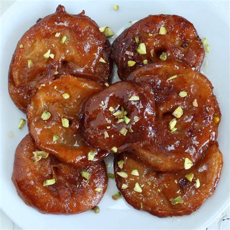 Apple Jalebi with Rabri - Apple Fritters soaked in saffron flavored ...