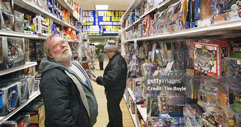 Shoppers peruse the aisles for sales at a closing KB Toys store... News ...