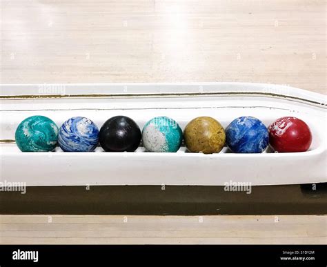 Multi-coloured duckpin bowling balls Stock Photo - Alamy