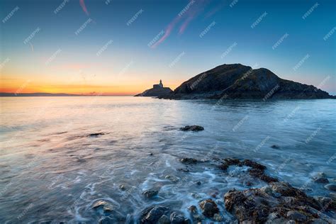 Premium Photo | Sunrise at mumbles beach