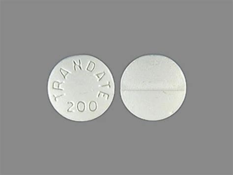 TRANDATE 200 Pill White Round - Pill Identifier