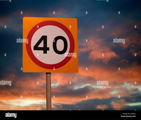 FORTY MILE AN HOUR ROAD SPEED LIMIT SIGN WITH TWILIGHT SKY BACKGROUND ...