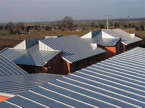 Zinc double locked standing seam panels for roof and wall. | Fine Metal Roof Tech