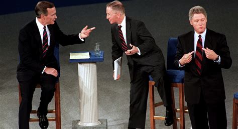 Bill Clinton connects, President George H.W. Bush checks watch during ...