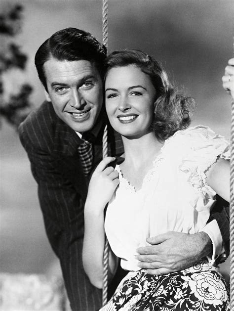 JAMES STEWART and DONNA REED in IT'S A WONDERFUL LIFE -1946-. Photograph by Album - Pixels