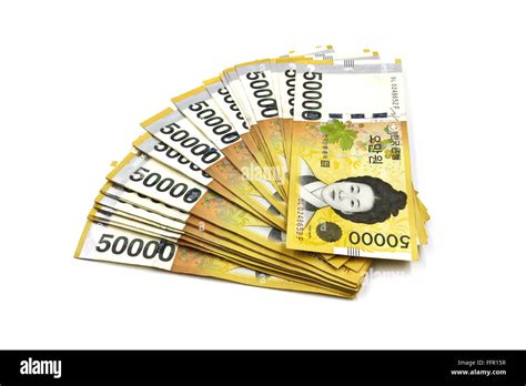 Korean Won currency bills isolated on white background Stock Photo - Alamy